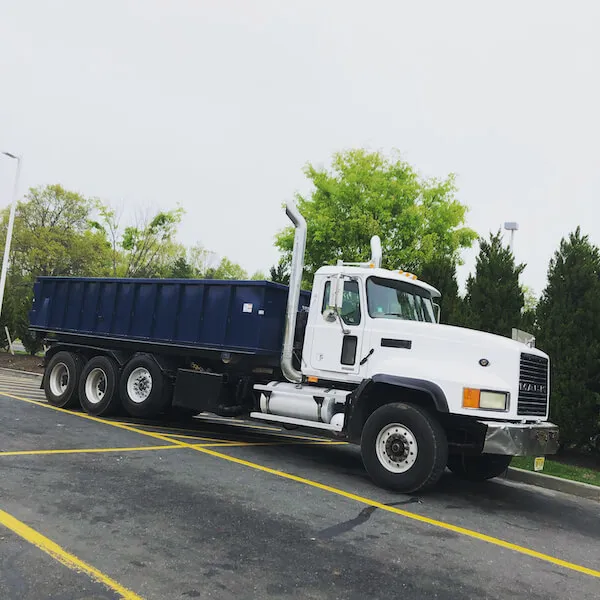 Broward county roll-off dumpster and truck