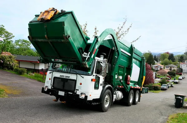 Residential trash collection with a dumpster in Maryland