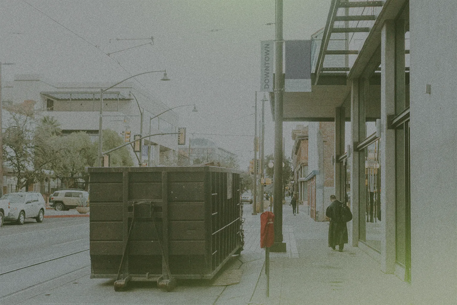 dumpster outside a business downtown