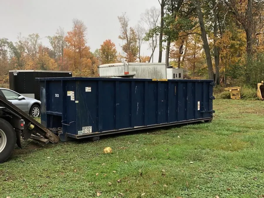 roll-off container on grass