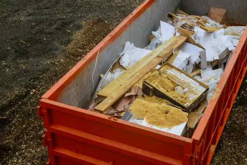Various materials in a dumpster