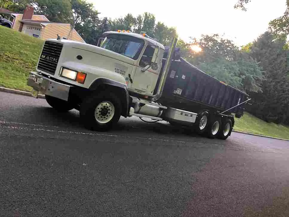 Dumpster truck on residential street