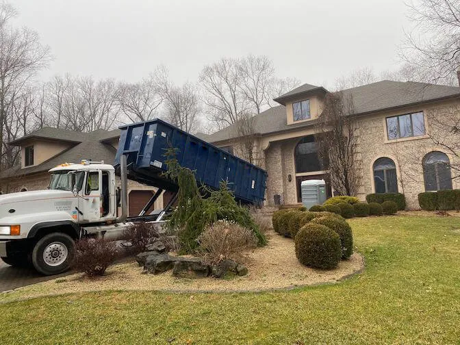 Picture of roll off dumpster being offloaded