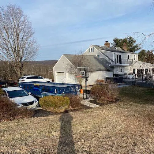 Picture of dumpster in driveway