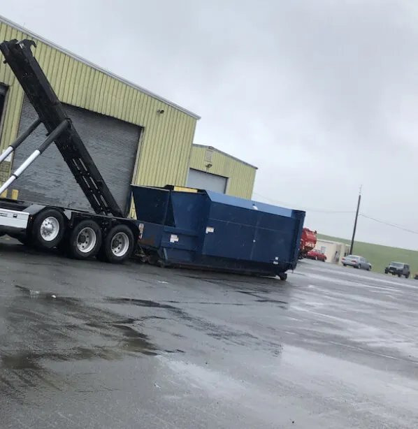 Dumpster being delivered in Greenville County South Carolina