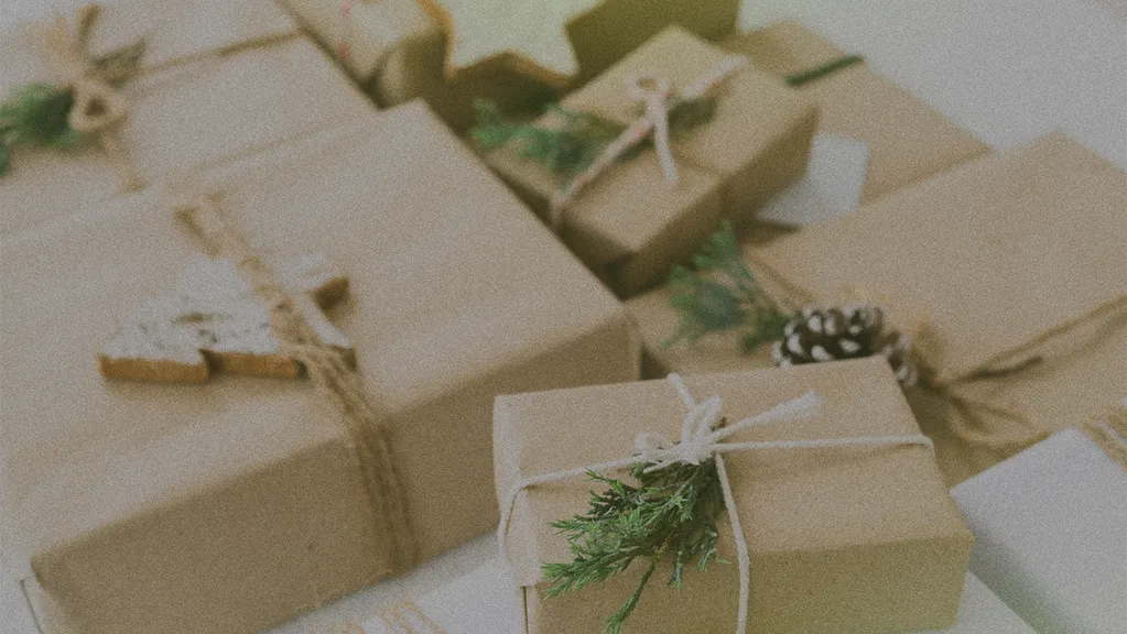 christmas gifts wrapped in brown kraft paper