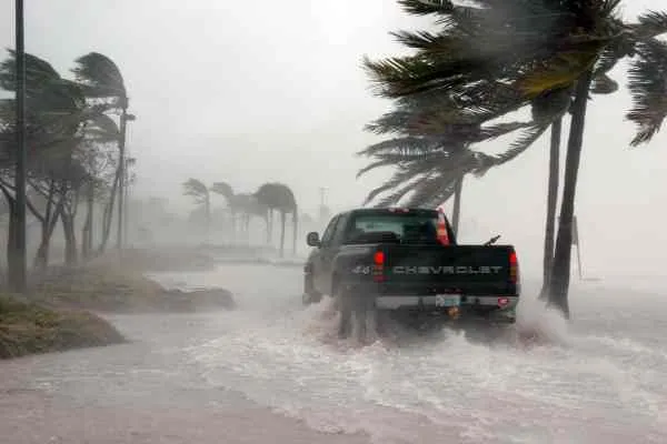 truck driving through hurricane