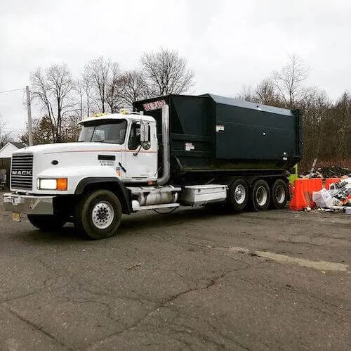 Roll off truck with dumpster in Monroe County PA