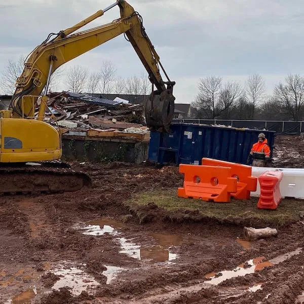 A machine loading dumpsters in Montgomery County PA