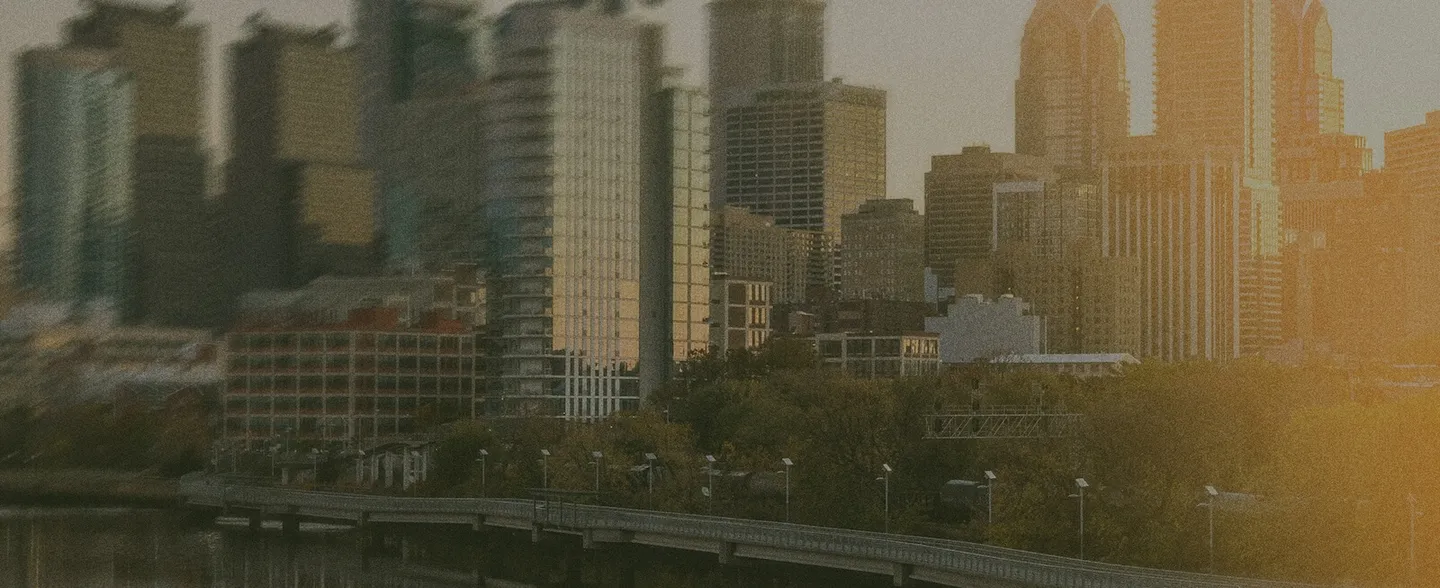 City skyline with Sourgum light leak filter
