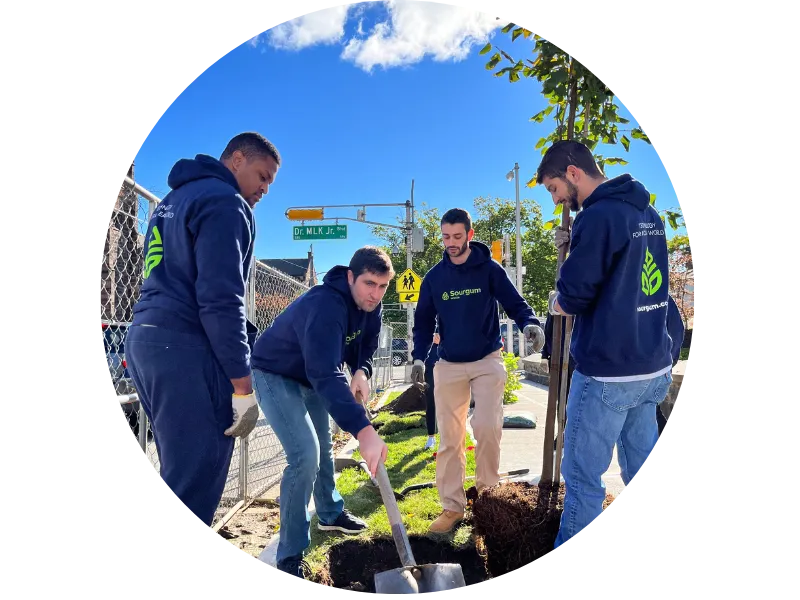 Sourgum Waste team planting tree