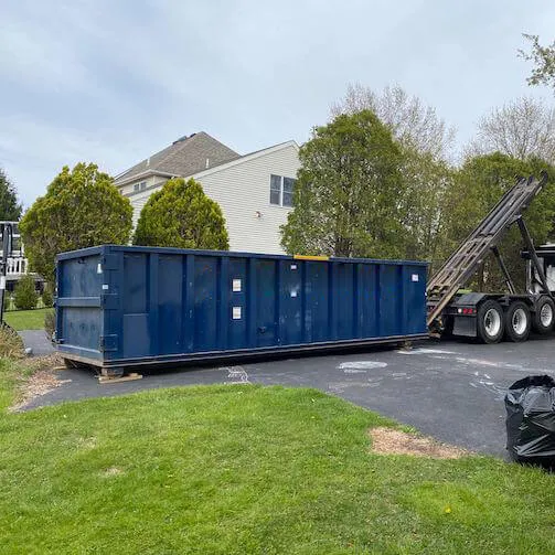 Image of large roll off bin on property 