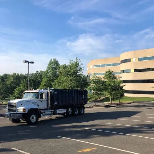 Picture of roll off truck in parking lot