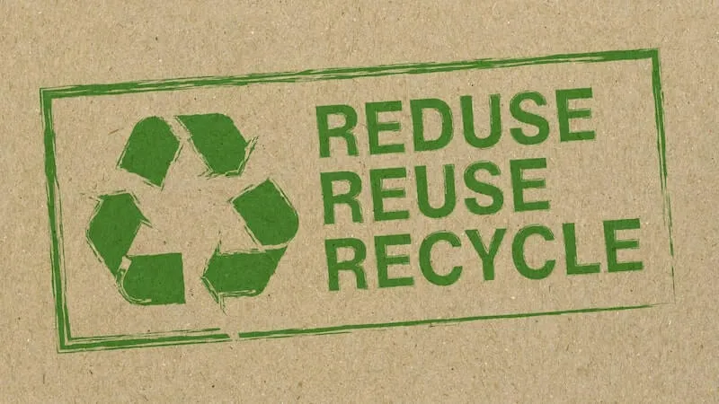 A sign for reduce, reuse, recycle